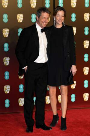 Hugh Grant et sa compagne Anna Eberstein aux BAFTA Film Awards 2018 à Londres, le 18 février