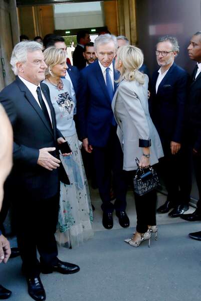 Exposition Christian Dior au Musée des Arts décoratifs à Paris : Hélène et Bernard Arnault et Brigitte Macron