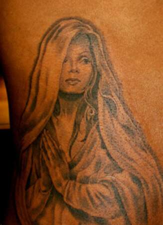 Tatouages de stars: Jermaine Dupri a un portrait de Janet Jackson en Vierge sur le flanc. Kitsch à souhait!