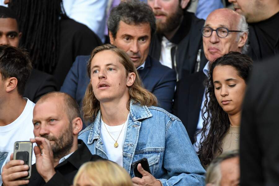 Pierre Sarkozy et Iman Perez dans les tribunes lors du match de championnat de Ligue 1 Conforama opposant le Paris 