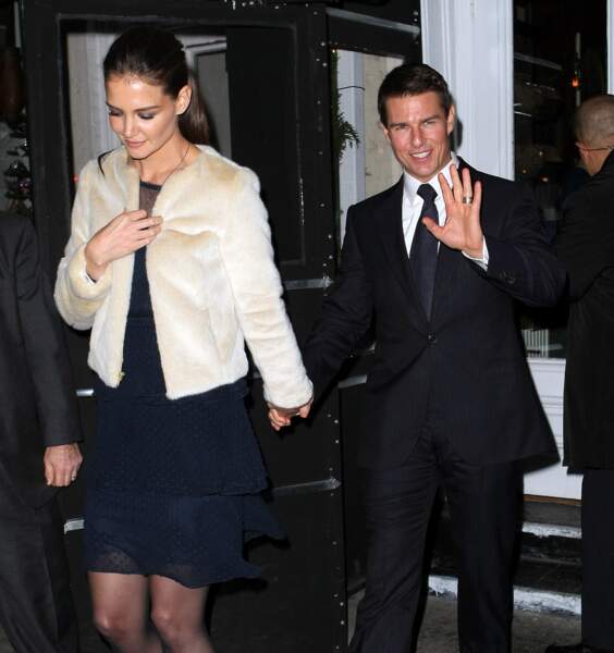 Katie Holmes et Tom Cruise à la sortie d'un restaurant en 2011