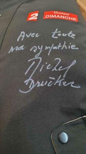 Un aperçu de l'autographe de Michel Drucker