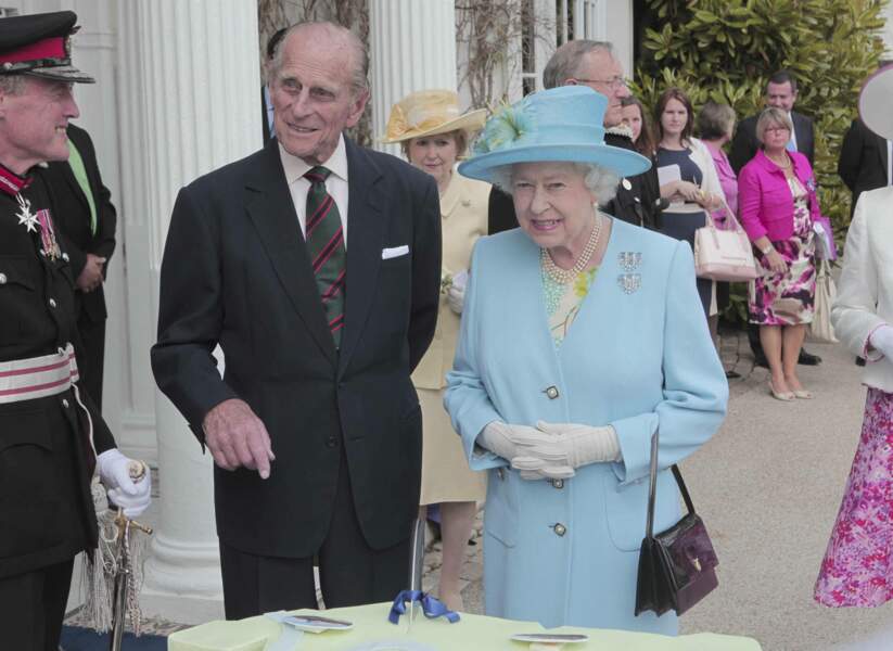 En 2012, la Reine Elizabeth II et le Prince Philip en promenade lors du Jubilé de Diamant de la Reine, célébrant ses 60 ans de règne.