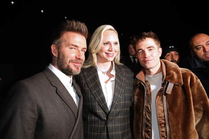 David Beckham, Gwendoline Christie et Robert Pattinson, stars internationales de l'événement, prennent la pose ensemble.