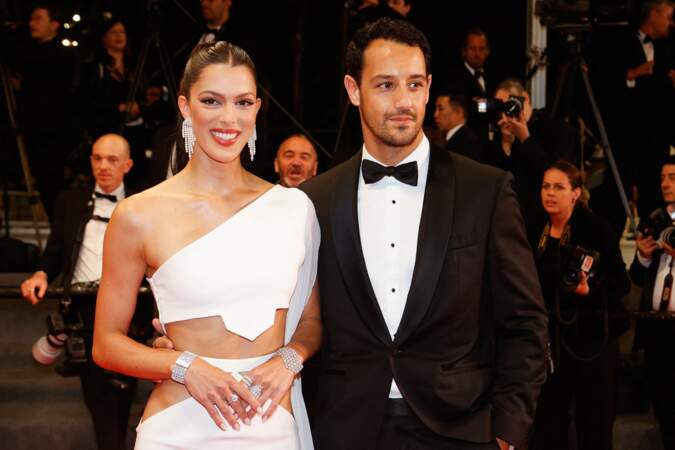 Iris Mittenaere et son fiancé Diego El Glaoui pour la montée des marches du film Le retour lors du 76ème Festival International du Film de Cannes, au Palais des Festivals à Cannes