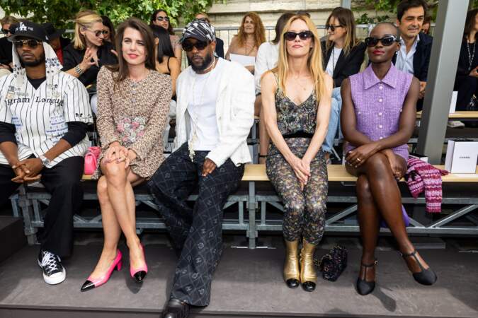 Kendrick Lamar with actress Lupita Nyong'o at Paris Fashion Week.