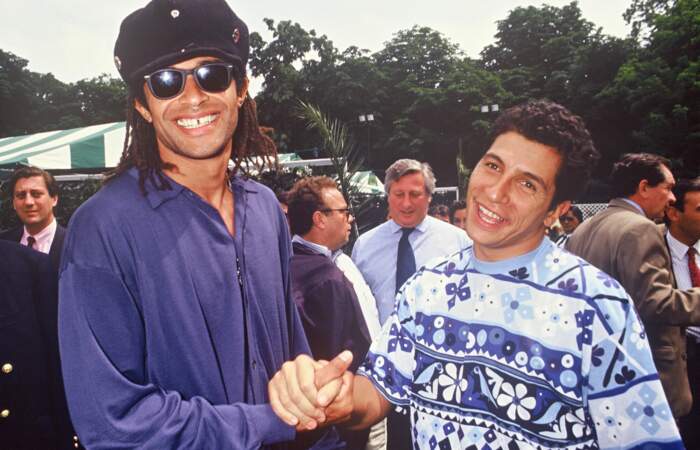 Yannick Noah (33 ans) et Nagui en 1993