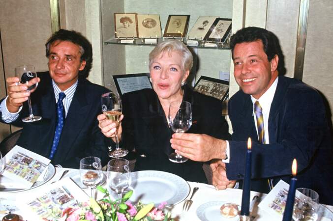 Line Renaud (63 ans), Michel Sardou et Michel Leeb à Paris en 1991