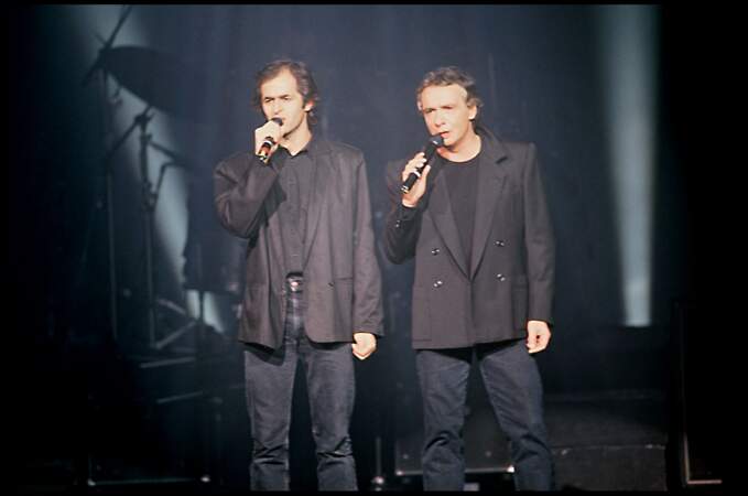 Michel Sardou (42 ans) et Jean-Jacques Goldman en 1989