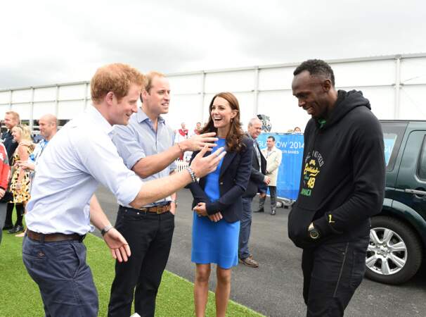 Le prince Harry, son frère et Kate Middleton passent un bon moment convivial en compagnie du sprinter jamaican Usain Bolt, en 2014