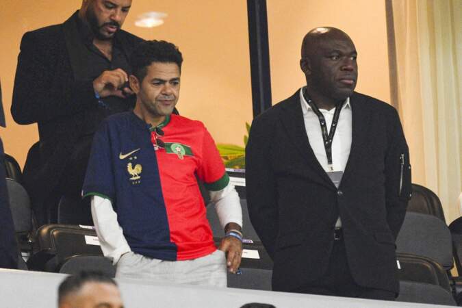 Jamel Debbouze et Wilfried Mbappé, le père de Kylian Mbappé dans les tribunes du match France - Maroc. 


