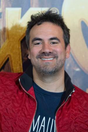 Alex Goude, l'un des animateurs phares du groupe M6 pose tout sourire durant le photocall d'Astérix et Obélix "L'Empire du Milieu"