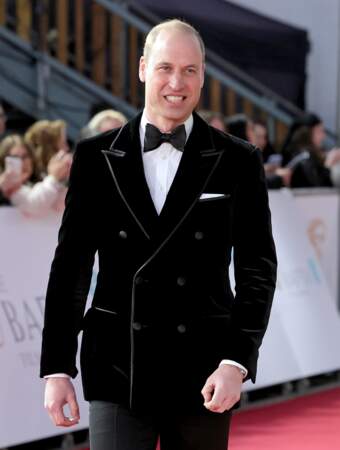 76e cérémonie des British Academy Film Awards (BAFTA) - Le prince William arbore un grand sourire devant les photographes de l'événement