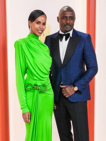 La star de la série Luther Idris Elba et sa femme Sabrina Dhowre Elba posent devant les photographes lors de la 95ème cérémonie des oscars le 12 mars 2023  