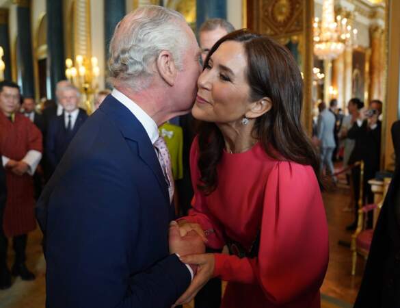 Réception à Buckingham Palace à la veille du couronnement : le roi Charles III et la princesse Mary du Danemark
