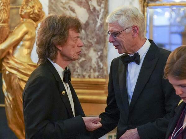 Mick Jagger (à gauche) et Arsène Wenger assistent au banquet d'État au château de Versailles.