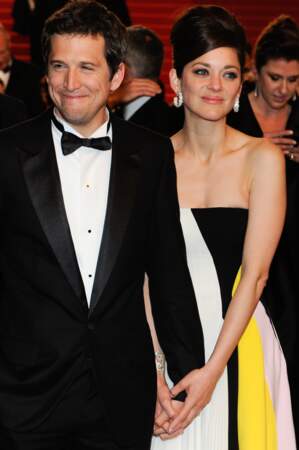 Marion Cotillard et Guillaume Canet lors de la descente des marches du film "Blood Ties" en 2013.